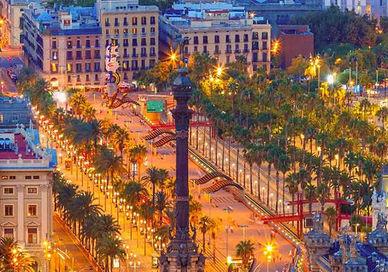 An image of a city at night, Barcelona Sailing Cruise Break.