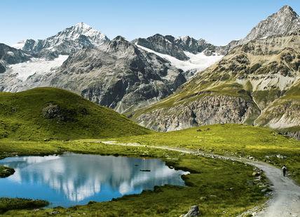 An image of a mountain lake in the mountains, Drive the World-Famous Klausen Pass. Getaway-Pseudo-Supplier