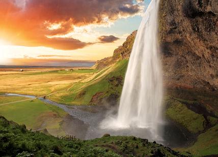 An image of a waterfall in iceland, Hunt the Northern Lights and Snorkel Between Continents on an Icelandic Adventure. Getaway-Pseudo-Supplier