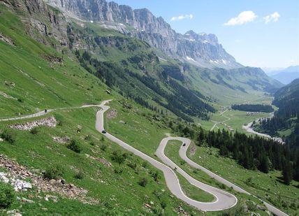 An image of a mountain road in the mountains, The Klausen Pass The Dolder Grand Hotel.