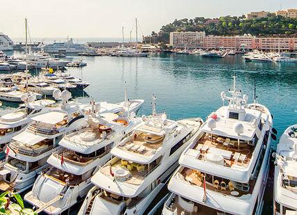 An image of a harbor with boats docked, Private yacht cruise.