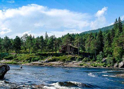 An image of a river in the mountains, Seven-Night Norway Salmon Fishing Adventure.