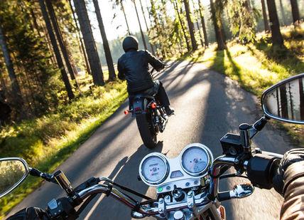 An image of a person riding a motorcycle, Three-Day Tour through South East England by Harley Davidson. Getaway-Pseudo-Supplier