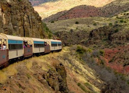 An image of a train going through a canyon, Two-night stay in a deluxe king room with breakfast at The Tavern Hotel & Spa.