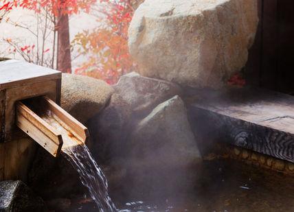 An image of a hot spring water fountain, Two-night stay in a traditional Ryokan in Kyoto.