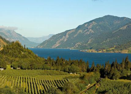 An image of a lake surrounded by mountains, Two Night Wine Getaway in Oregon. Getaway-Pseudo-Supplier