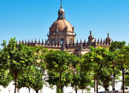 An image of a city with trees and buildings, Two nights in a 5-star hotel in central Jerez.