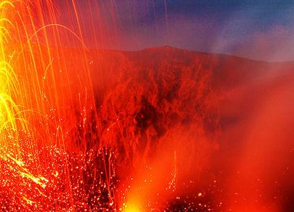 An image of a volcano with a fire coming out, Volcanic Adventure on Stromboli.