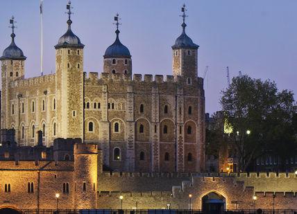 An image of a castle at night, The Tower of London.