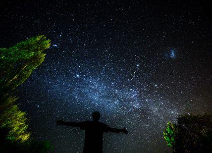 An image of a person standing in the dark, Stargazing and Two-Night Stay. Glenapp Castle