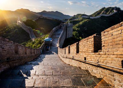 The great wall of china at sunset.