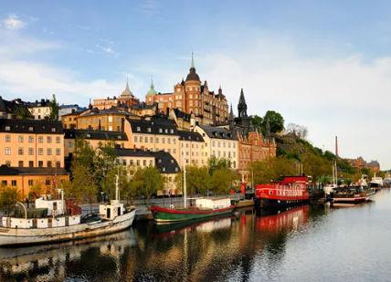 An image of a river with boats in it, Spa + Breakfast (Head Start Treatment) at Raison d'Etre Spa. Grand Hôtel Stockholm Spa