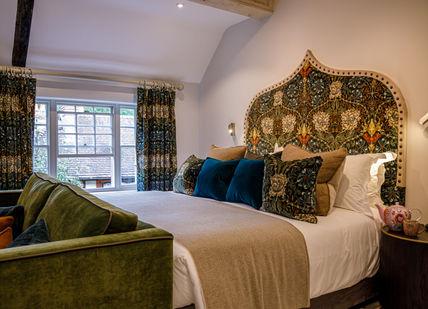 An image of a bedroom with a bed and a couch, An Overnight Stay At Great Fosters And Tasting Menu. Great Fosters