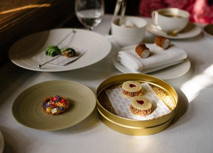 An image of a table setting with plates and cups, An Overnight Stay At Great Fosters And Tasting Menu. Great Fosters