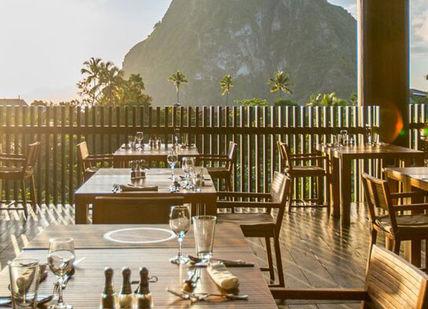 An image of a restaurant with a view of the mountains, Caribbean Cocoa Estate Getaway. Hotel Chocolat Saint Lucia