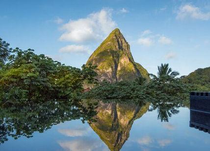 An image of a mountain in the middle of a lake, Caribbean Cocoa Estate Getaway. Hotel Chocolat Saint Lucia