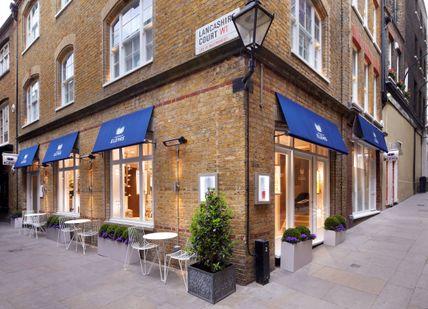 An image of a restaurant with a blue aw, House of Elemis. House of Elemis