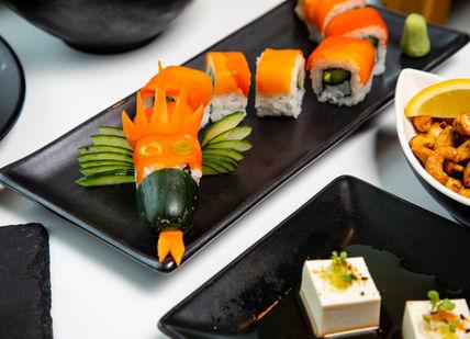 An image of a plate of food on a table, Sushi and Sake Masterclass. inamo Restaurants