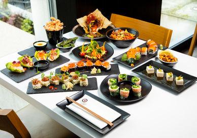 An image of a table with a variety of food, Unlimited Asian Tapas & Sushi with Bottomless Beer or Wine. inamo Restaurants