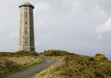An image of a lighthouse on a hill, Lighthouse Break with Classic Car. Irish Landmark Trust