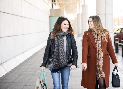 An image of two women walking down the street, Half Day Personal Shopping Experience. Jennifer Jones Styling