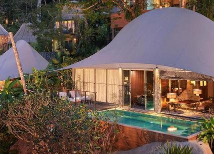 An image of a resort with a pool and a tent, Six Nights stay at Keemala Phuket. Keemala Phuket