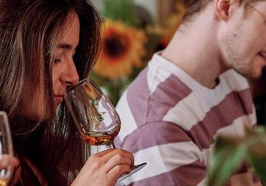 An image of a couple having a meal, Premium Scotch Whisky Tasting. Liquor Studio