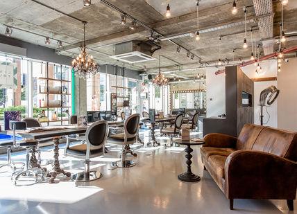 An image of a salon room with chairs and lights, Shampoo, Head Massage + Ladies Cut and Blow Dry + Ultimate treatment + FUL Intense Moisturising Hair Mask (Take Home) . Live True London