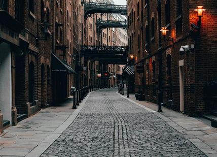 An image of a cobbed street in the city, Jack the Ripper Tour. London Mystery Walks