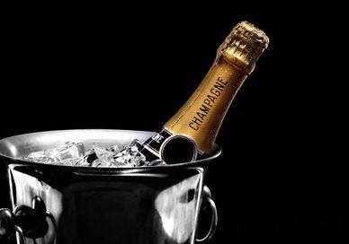 An image of a bottle of champagne in a bucket, Champagne and Sparkling Wine Masterclass. The London Wine Academy