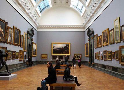 An image of a museum with people looking at paintings, Private National Gallery Tour. LookUp London