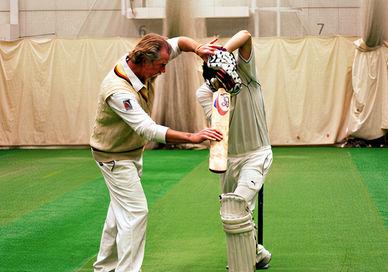 An image of two men playing cricket, Private Cricket Lesson. Lord's Indoor Cricket Centre