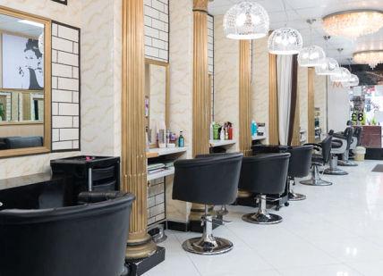 An image of a salon with chairs and mirrors, LS Hair London. LS Hair London