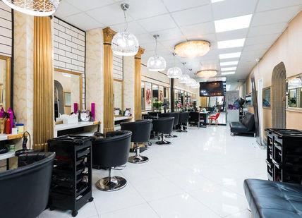 An image of a salon with chairs and mirrors, LS Hair London. LS Hair London
