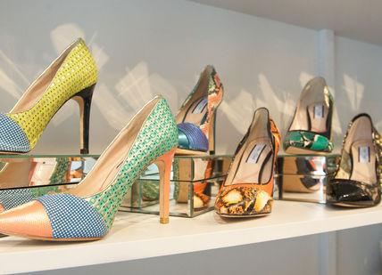 An image of a display of shoes, Bespoke styling evening. Lucy Choi London Boutique