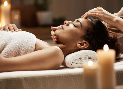 An image of a woman getting a massage, Day Spa Delight London. Luenire