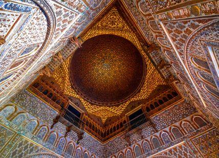 An image of a dome in the ceiling of a mosque, Tickets and private tour of Royal Alcázar and Seville Cathedral. The Magic of Seville
