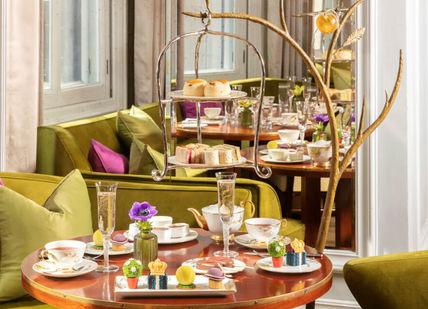 An image of a restaurant setting, Champagne Paired Afternoon Tea. Mandarin Oriental - The Rosebery