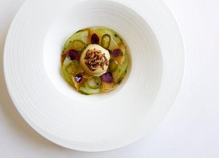 An image of a plate of food on a table, 5 course menu. Marcus