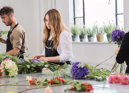 An image of a woman making flowers, One-Day Flower Masterclass. McQueens