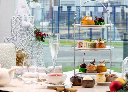 An image of a table with a tea set, Laurent-Perrier Champagne Afternoon Tea. Meridian Lounge