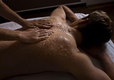 An image of a man getting a back massage, Skin Detoxifying body scrub with COMO Shambhala massage . Metropolitan by COMO