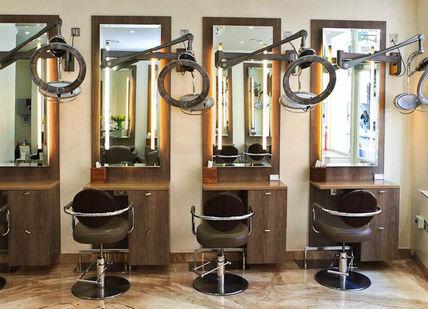 An image of a hair salon with chairs, Michaeljohn. Michaeljohn