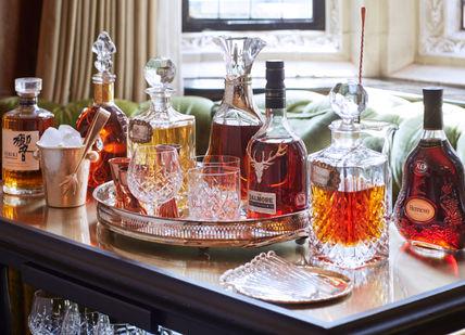 An image with bottles of whiskeys at Milestone hotel