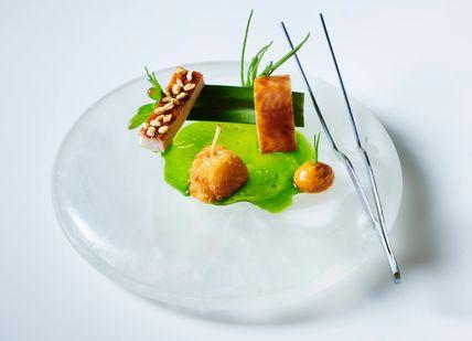 An image of a plate with food on it, Theatrical Gastronomic Show With 10-Course Tasting Menu. The Monarch Theatre
