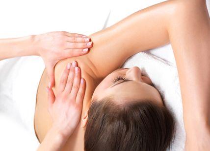 An image of a woman getting a massage, Serene Spa Day. Moor Hall Hotel & Spa