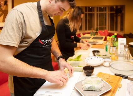 An image of a man preparing food in a kitchen, Asian Vegan Cooking Class. My Exotic Kitchen