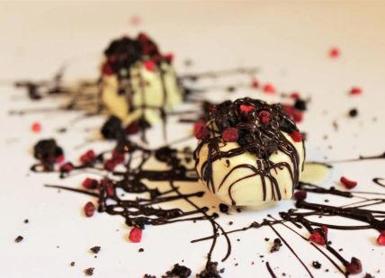 An image of a dessert with chocolate and cher, Luxury Chocolate Making Workshop. Mychocolate