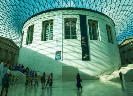 An image of people inside the british museum, Highlights Tour of The British Museum. In The Name of The Crown