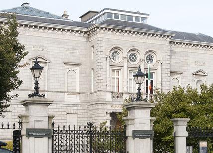 An image of a building with a clock on it, Private tour. National Gallery Ireland
